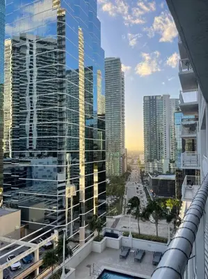 a view of a city with tall buildings and a pool at Rooftop Pool with Water View in Miami