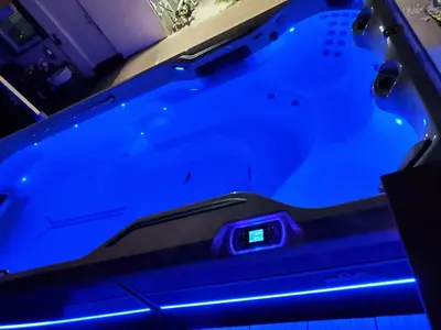 a blue light on the back of a car at Private and beautiful room for vacation in Carver Ranches