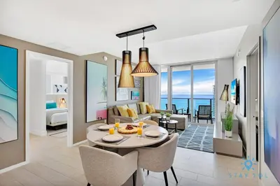 a rendering of a living room and a dining room at Oceanfront Balcony - Amazing Pools - Gym in Hollywood