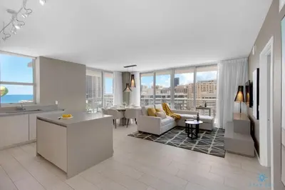 a kitchen and living room with a view of the city at Wrap Around Balcony, Paradise Beach & Amazing Pools in Hollywood