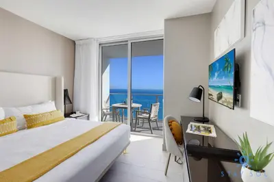 a bedroom with a bed and a view of the ocean at High Floor 2BR -2 BA - Resort Fees & Parking Incl in Hollywood