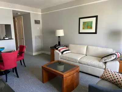 a living room with a couch and a table at Four Seasons Hotel Miami - Luxury Private Residences in Miami