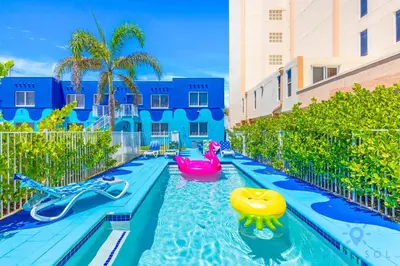 a pool at a resort with inflatables in the water at Free Parking - Bay View - Pool - Step To Beach in Hollywood