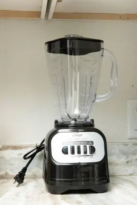 a blender sitting on top of a counter at The Hideaway at Lake Ridge 2 in Fort Lauderdale