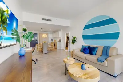a living room with a couch and a table at Amazing Pool - Balcony - Up To 6 - Near Beach in Hollywood