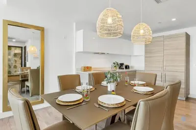 a dining room with a table and chairs at Hollywood Beach - Front Bay View - Amazing Pool in Hollywood