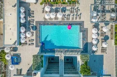 an overhead view of a swimming pool in a building at Lovely Apartment-Rooftop Oasis - Bay View in Hollywood