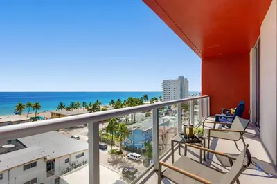 a balcony with a view of the ocean at Ocean View Balcony - Rooftop Pool & Hot Tub - Gym in Hollywood