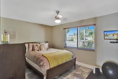a bedroom with a bed and a window at Hollywood Villa close to the BEACH w/HEATED POOL in Hollywood
