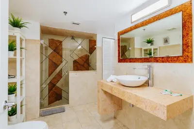 a bathroom with a sink and a shower at Amazing 2 BR APT at Brickell, Free Parking in Miami