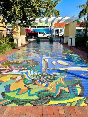 a painting on the ground on a sidewalk at Miami House in Miami