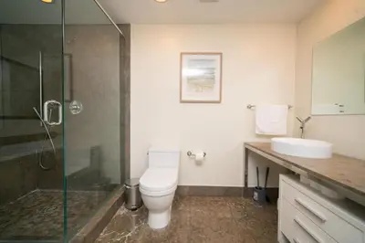 a bathroom with a toilet and a shower and a sink at W Hotel Miami Stunning Private Condo With Access to All Hotel Amenities in Miami
