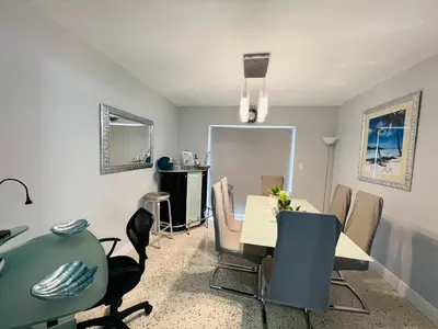 a dining room with a table and chairs at Relax 523 in Miami