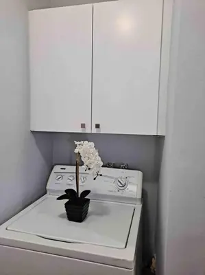 a white stove with a plant on top of it at Relax 523 in Miami