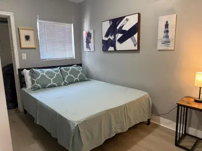 a bedroom with a bed in a room at Modern cozy home with private patio - Sleeps 6 in Miami