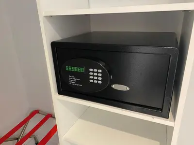 a microwave oven sitting on a shelf in a kitchen at Cozy BeachWalk Nest 2 Full Beds, Steps to Ocean -2010B in Hallandale Beach