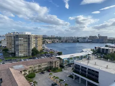 an aerial view of a city with a body of water at Premium Oceanview Living Full Kitchen & Miami Chic Vibes -14 A in Hallandale Beach