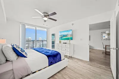 a bedroom with a bed and a ceiling fan at High Floor Unit Located in Brickell - Free Parking in Miami