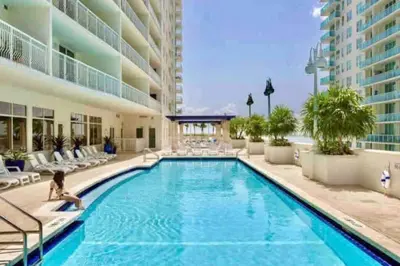 a swimming pool in the middle of a building at 40th Floor Priceless Unit Central Location in Miami