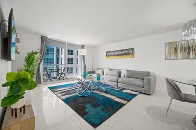 a living room with a couch and a table at Amazing location W Parking in Miami in Miami