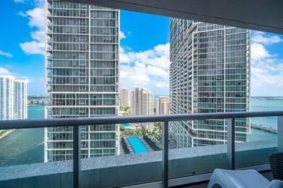 a balcony with a view of the water and buildings at Iconic Icon W Unit - Pool & Ocean Views in Miami