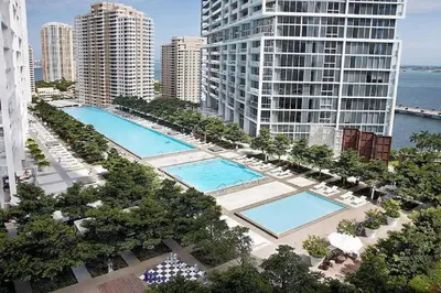 an aerial view of two pools in a city with buildings at Iconic Icon W Unit - Pool & Ocean Views in Miami