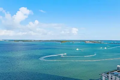 an aerial view of a large body of water with boats at INCREDIBLE OCEAN VIEW 3 BEDROOMS UNIT in Miami