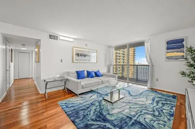 a living room with a couch and a glass table at INCREDIBLE OCEAN VIEW 3 BEDROOMS UNIT in Miami