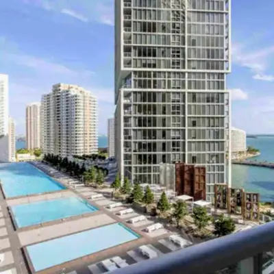 an aerial view of a building with a swimming pool at Vacation Apartment for Couples in Miami in Miami