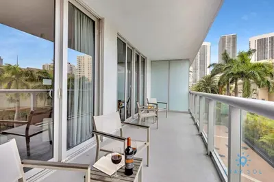 a balcony with a view of the city at MODERN Resort Modern apartment 2 BR 2 BR POOL in Hallandale Beach