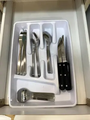 a white tray filled with utensils in a drawer at Ocean Reserve 222 STR-2158 in Miami Beach