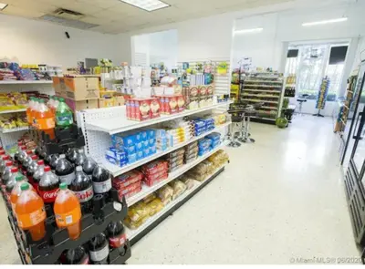 a grocery store aisle with a lot of food and drinks at Ocean Reserve 207 - STR 2270 in Miami Beach