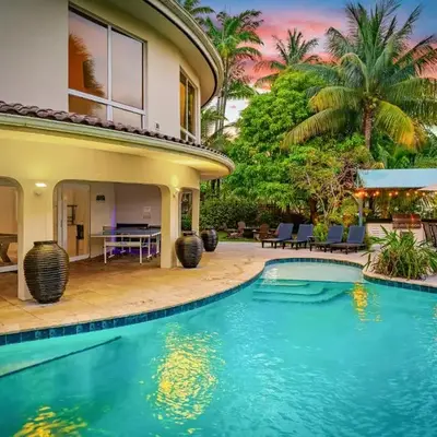 Waterfront Retreat: 7BR Villa with Pool Firepit