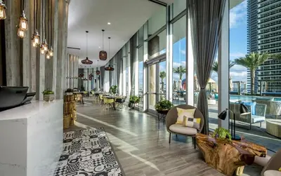 a lobby with a view of a city at Beachfront Condo - Amazing Pool - Oceanview Balcony in Hollywood