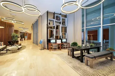 a living room with a table and some chairs at Ocean View Beachfront 2Bed/2B M-Penthouse @HYDE in Hollywood