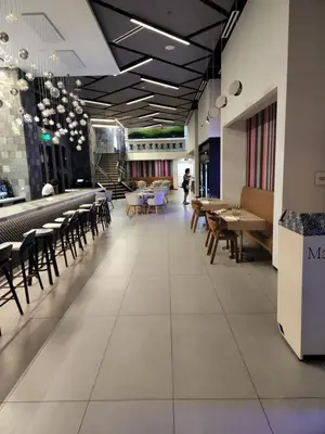 a dining room with tables and chairs in a restaurant at Amazing Condo in Downtown Miami/Brickell w/PARKING in Miami