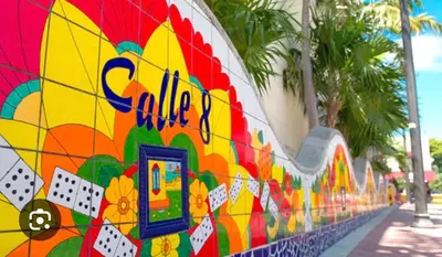 a colorful mural on the side of a building at LYZ Miami Airport in Miami