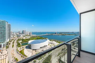 a view of the city from the balcony of a building at The Elser Hotel Miami - An All-Suite Hotel in Miami
