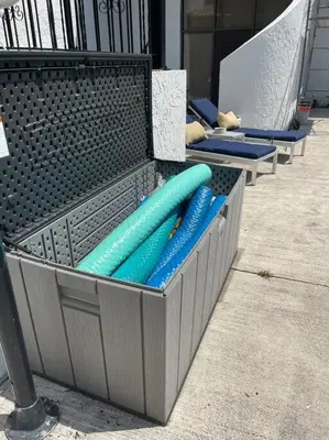 a container filled with blue inflatable at Villa at St. James Place “H”, Luxury, Pet Friendly in Miami