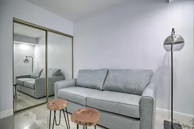 a living room with a couch and two tables at Less Than Half-Mi to Beach Sunny Isles Resort Condo in Miami Beach
