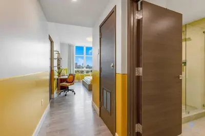 a hallway with a door leading to a room at Hollywood Beach Broad - walk - Gym - Amazing Pool in Hollywood
