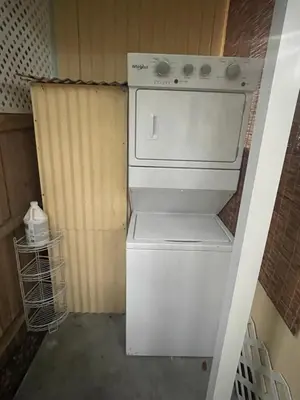 a white washer and dryer in a room at Key West Style Historic Home in Coconut Grove Florida The Yellow House in Miami