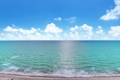 a view of the ocean from the beach at Ocean Front State Of The Art in Hollywood