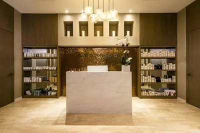 a salon with a counter in a room with shelves at Million Dollar Ocean Front Penthouse by Zen Vacation Rentals in Hollywood