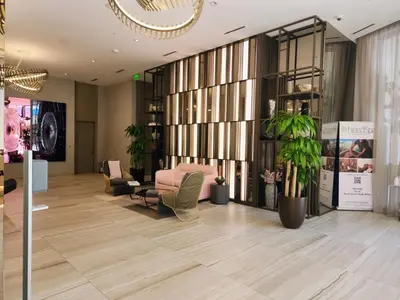 a lobby with a couch and chairs and a table at Modern Waterfront Retreat with Scenic Views in Hollywood