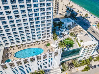 an overhead view of a large building with a swimming pool at Luxury Suite at Fort Lauderdale in Fort Lauderdale