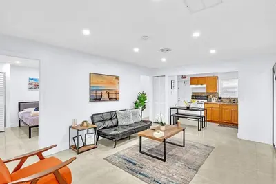 a living room with a couch and a table at Hollywood 2 Bdrm New Furnished Beach Vacation LB2 in Hollywood