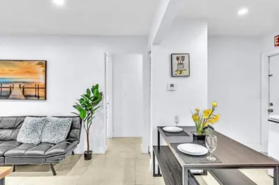 a living room with a couch and a table at Hollywood 2 Bdrm New Furnished Beach Vacation LB2 in Hollywood