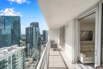 a balcony with a view of a city at Deluxe 1 Bedroom Apartment • Brickell • Ocean View in Miami