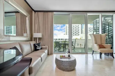 a living room with a couch and a table at Penthouse Bahia Mar South Beach on Ocean Drive Miami Beach home in Miami Beach